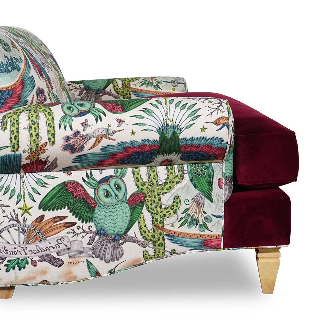 Puddin sofa in bold pattern fabric with velvet seat and contrasting welt
