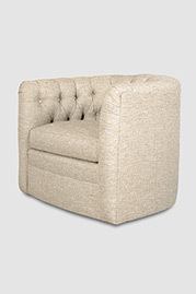 Oliver barrel chair with tufted back, swivel base, and cushion seat in fabric