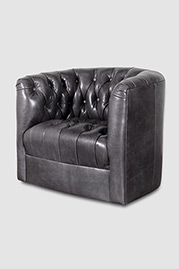 Oliver barrel chair with tufted back and seat, swivel base, and Mont Blanc Wolf leather