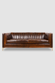 86 Harley channel-tufted sofa in Maxximum Overdryve brown leather with brushed gold legs