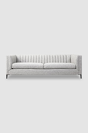 Harley channel-tufted sofa in Cortlandt Dalmation performance fabric with black metal legs
