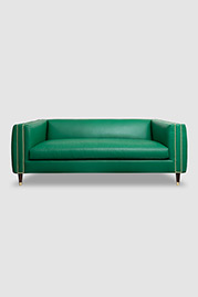 79 Electra exerior channel-tufted sofa in Brisa Original Esmerelda green faux-leather with bench cushion and brass-capped legs