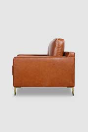 Customized Coach armchair without side arm pillows in No Regrets True Grit performance leather