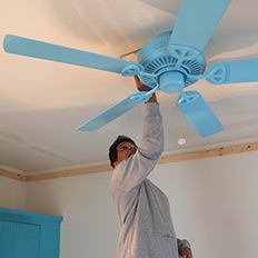 The simple, spray-painted ceiling fan will disappear.