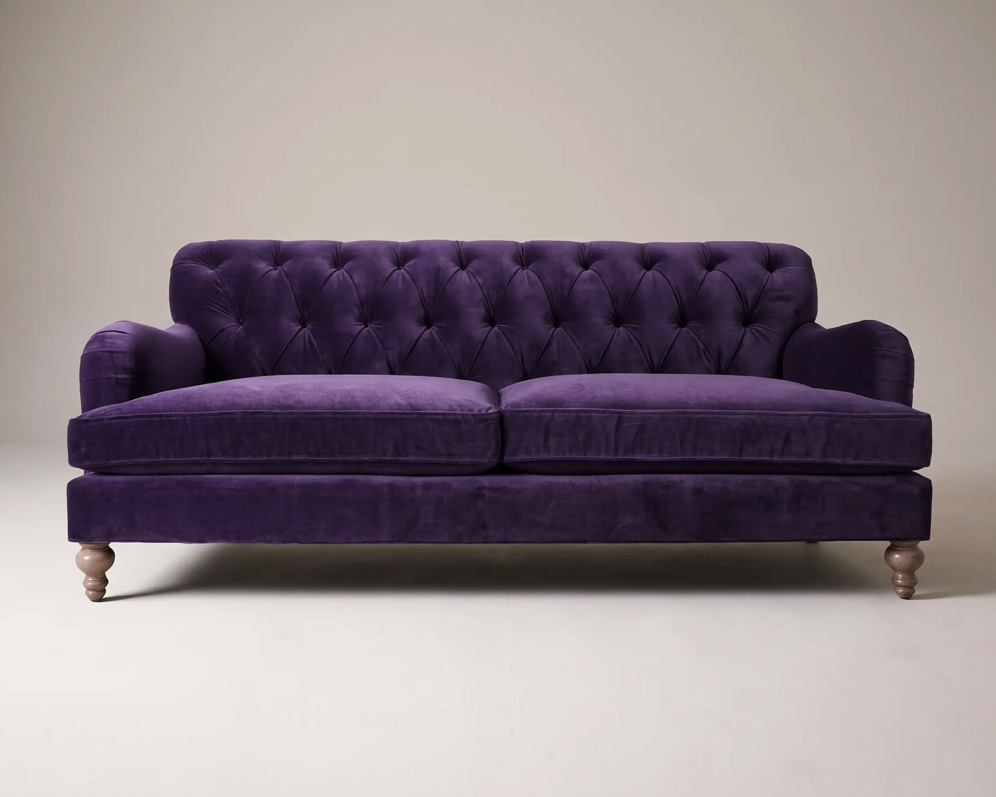 Alfie tufted English roll arm sofa