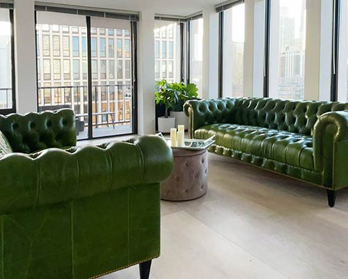 Customer image: Higgins Chesterfield sofas in Mont Blanc Evergreen leather