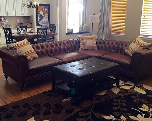 Customer image: Higgins Chesterfield sectional in brown leather