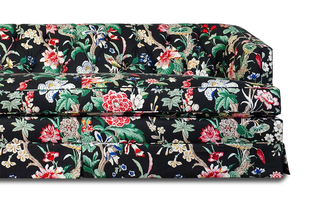 Olympia sofa in floral pattern with skirt