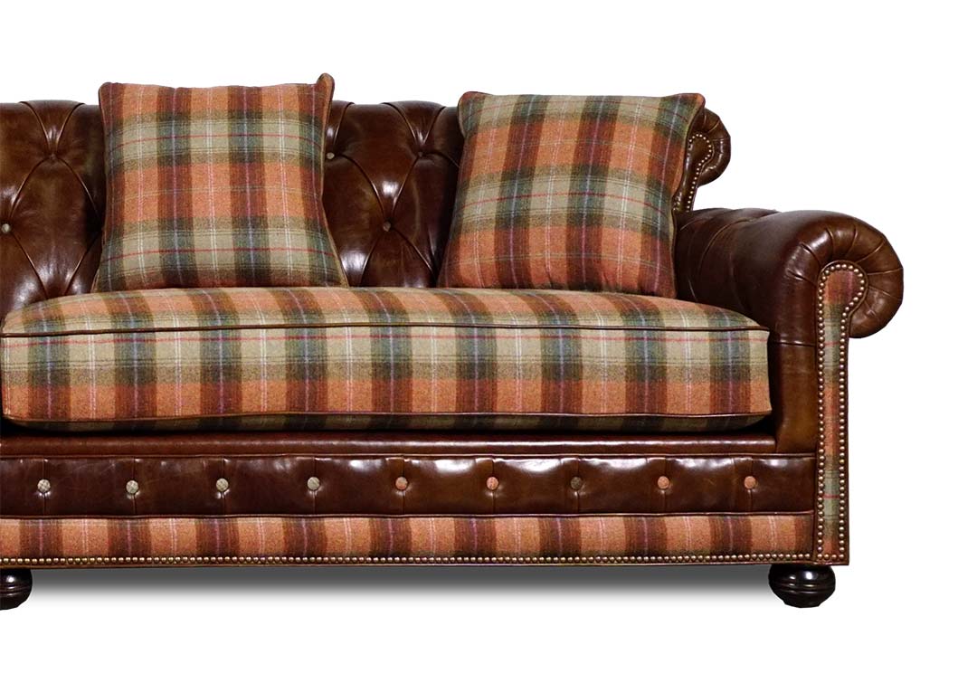 Sylvester sofa in custom leather and plaid