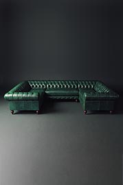 Higgins U sectional in green leather