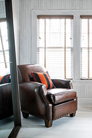 Howdy Parisian club chair in hand-stained brown leather