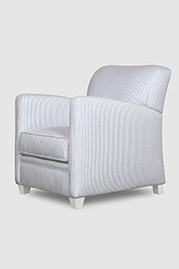 Pegeen armchair in ticking fabric with custom white legs