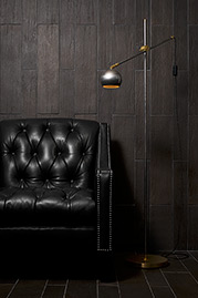 Lincoln tufted armchair in black leather with Stan floor lamp