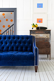 Lincoln tufted loveseat in Cannes Lapis blue velvet with nail head trim