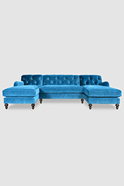 Alfie tufted sectional in Como Cyan velvet fabric