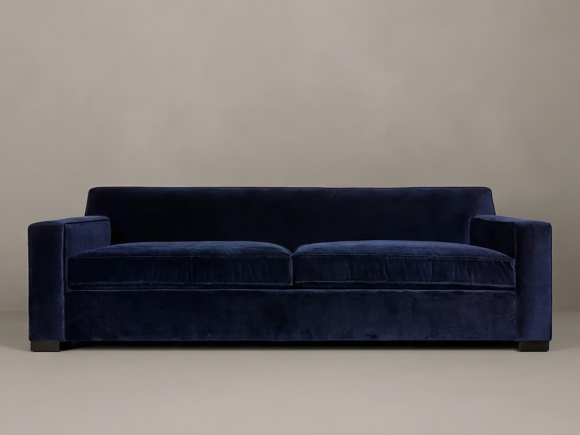 105 Bobby sofa in Como Indigo blue velvet with ebony legs