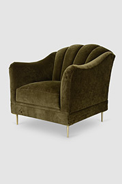 Carla channel-tufted camel back armchair with brushed brass stilleto legs and Como Olive velvet fabric