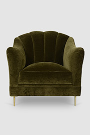 Carla channel-tufted camel back armchair with brushed brass stilleto legs and Como Olive velvet fabric