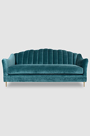 Carla sofa in Como Bluestone velvet with bench cushion and brass legs