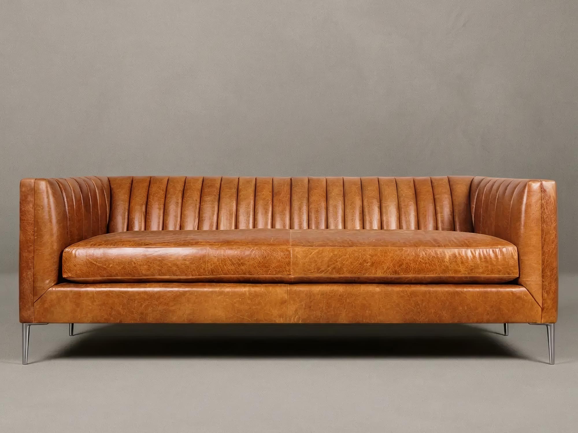 93 Harley channel-tufted sofa in Caprieze Copper Glaze leather with bench cushion and aluminum legs