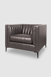 Harley channel-tufted shelter arm chair in Chiaro Greyhound leather with black metal legs