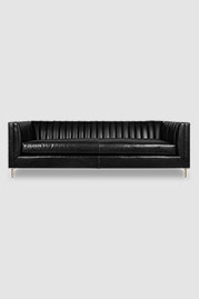 93 Harley channel-tufted sofa in Cortina Piano black leather with bench cushion and brass legs