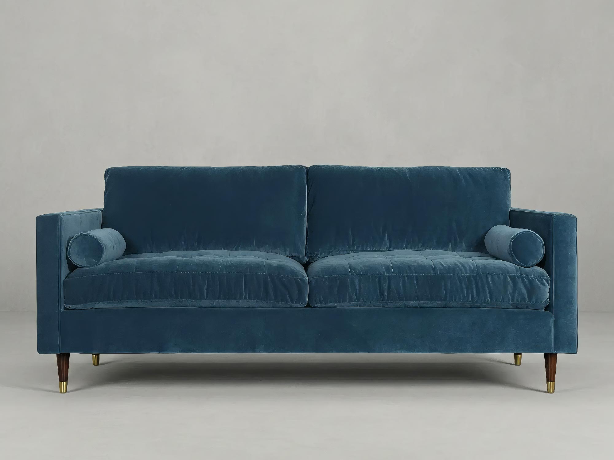 86 Natalie sofa in Como Bali with bolster pillows and brass-capped feet