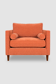 44 Natalie armchair in Ludlow Tangelo orange stain-proof fabric and bolster pillows