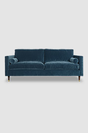 86 Natalie sofa in Como Bali blue velvet with bolster pillows and brass-capped legs