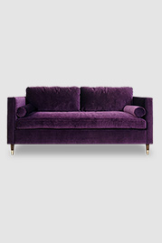 79 Natalie sleeper sofa in Como Deep Purple velvet with bolster pillows and legs with sabots