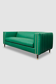 79 Electra exerior channel-tufted sofa in Brisa Original Esmerelda green faux-leather with bench cushion and brass-capped legs