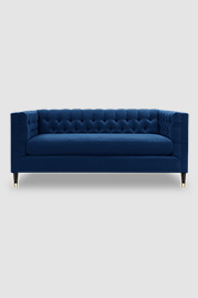 Dot loveseat in Crosby Federal stain-resistant blue velvet with bench cushion and brass-capped wood legs