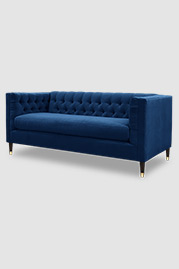 Dot loveseat in Crosby Federal stain-resistant blue velvet with bench cushion and brass-capped wood legs