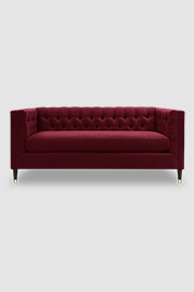 Dot loveseat in Crosby Cerise stain-resistant red velvet with bench cushion and brass-capped wood legs