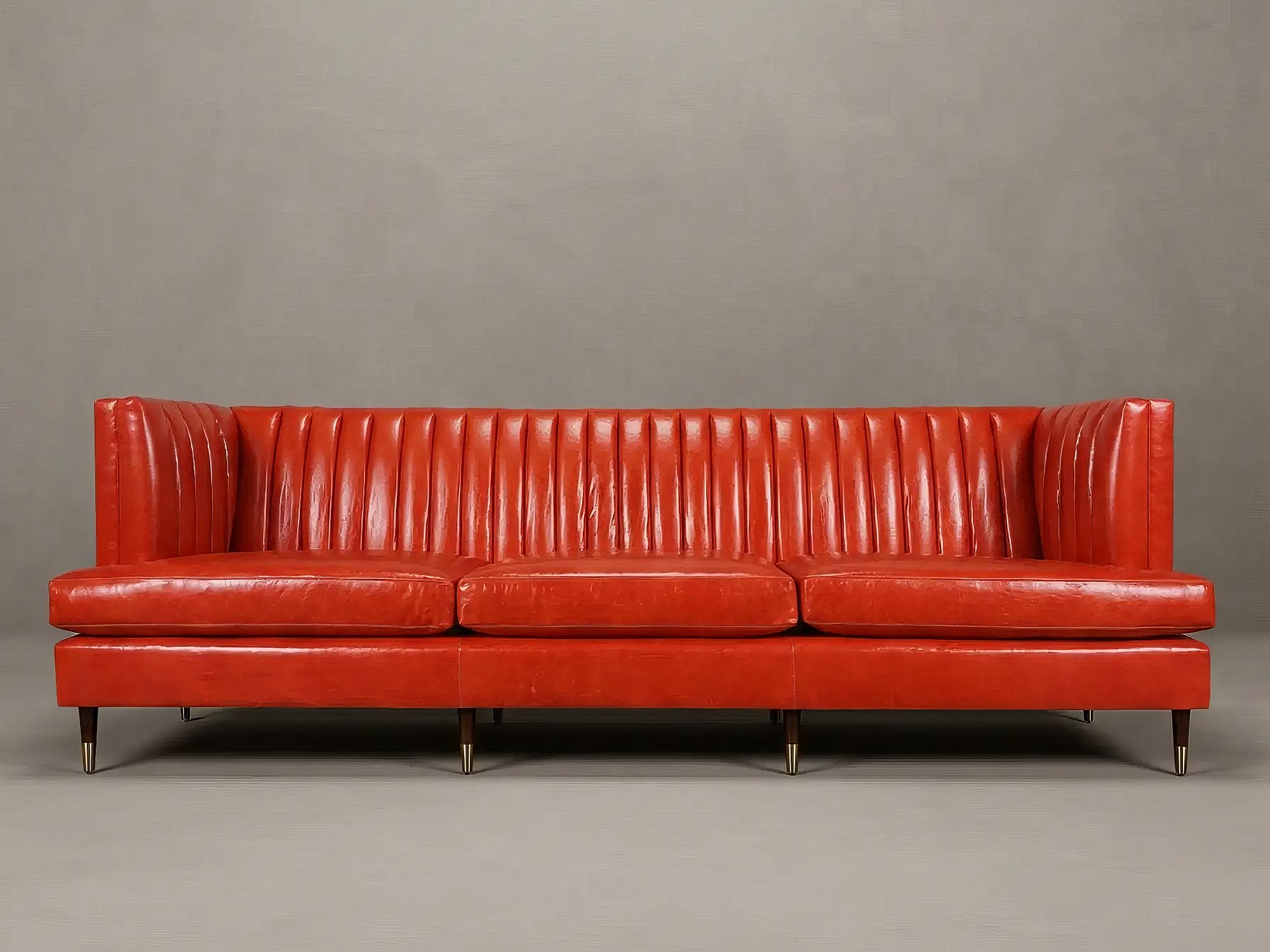 114 Erica sofa in Athene Rosso with brass-tipped legs