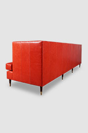 114 Erica sofa in Athene Rosso with brass-tipped legs