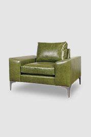 43 Cricket contemporary armchair in Cortina Poblano 7284 green leather