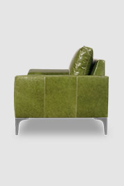 43 Cricket contemporary armchair in Cortina Poblano 7284 green leather