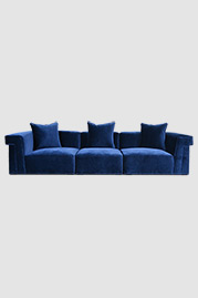 Baxter modular sofa in Como Indigo blue velvet with glider feet