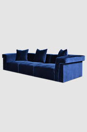 Baxter modular sofa in Como Indigo blue velvet with glider feet