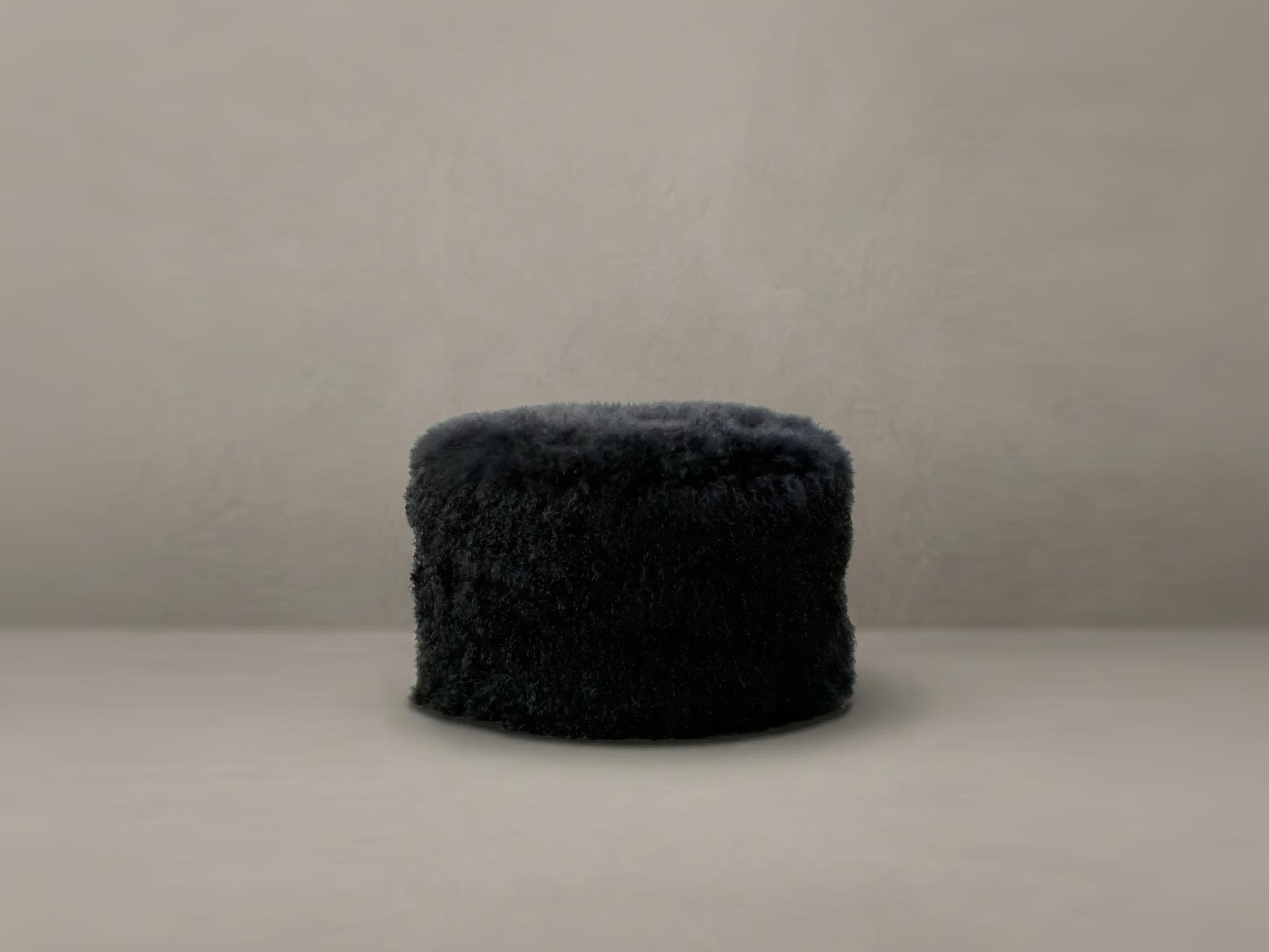 Cousin Sit ottoman in Gobi Grombre Tibetan sheepskin