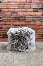 Cousin Sit ottoman in Gobi Grombre Tibetan sheepskin