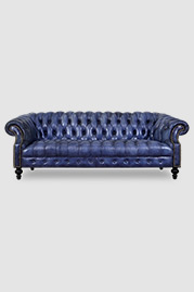 Cecil sofa in blue hand-stained leather with tufted seat