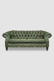 Cecil sofa in Vintage Envy green leather with contrasting orange buttons and orange stitching