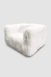 Ski Bum armchair in Cashmere Tibetan sheepskin with brass stiletto legs