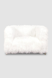 Ski Bum armchair in Cashmere Tibetan sheepskin with brass stiletto legs