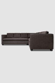 Greta sectional in Curly Q Chocolate performance fabric with blue leather welt