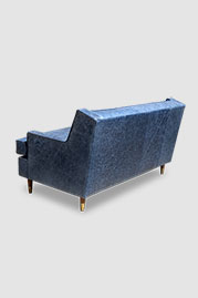 Ladybird sofa in Caprieze Denim Style blue leather with bench cushion and taper legs with sabots
