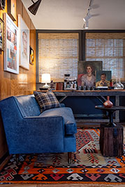 Ladybird sofa in Caprieze Denim Style blue leather with bench cushion and taper legs with sabots