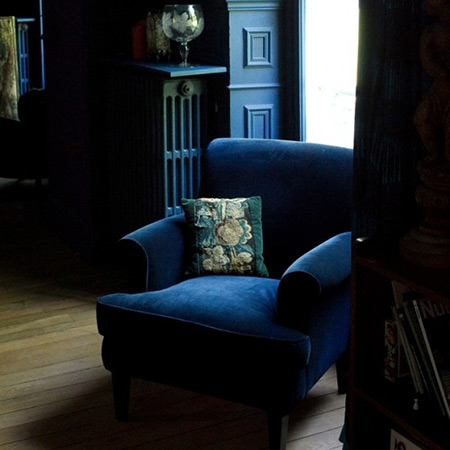 Blue velvet armchair